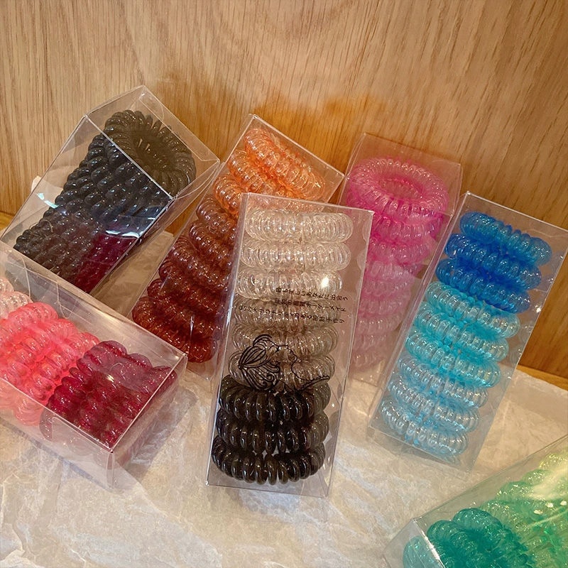9個入り/箱、電話線風の伸縮性ヘアバンド、透明ゴムバンド、ら - Silicone Band Women のレビューと価格